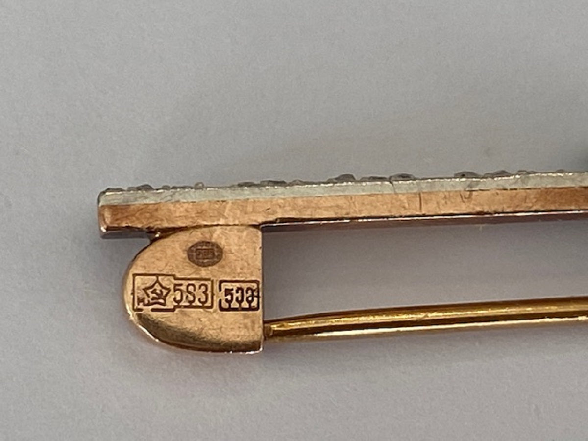 Emerald Radiance Brooch