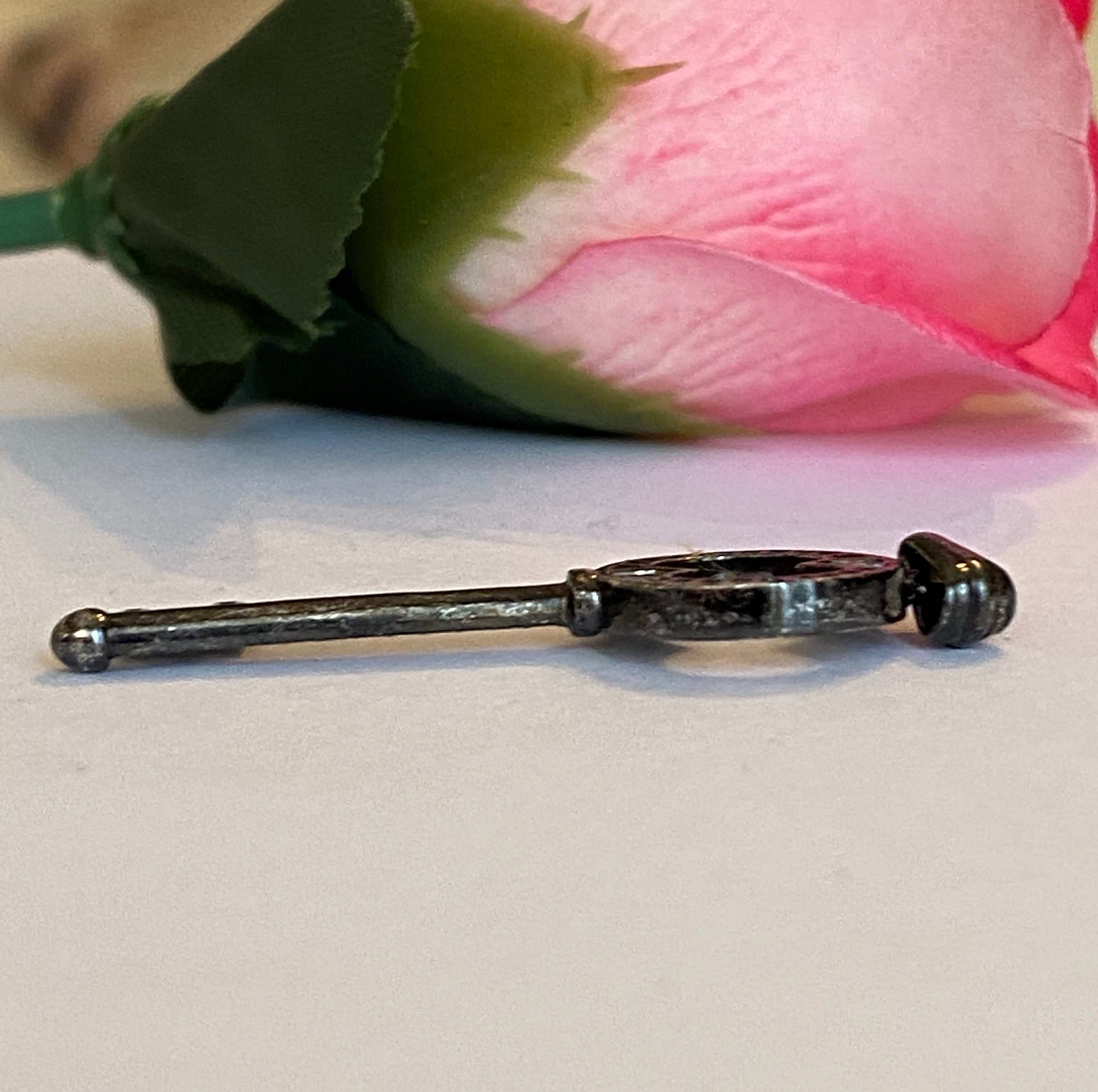 Black rhodium-plated solid 18 kt gold diamond key pendant