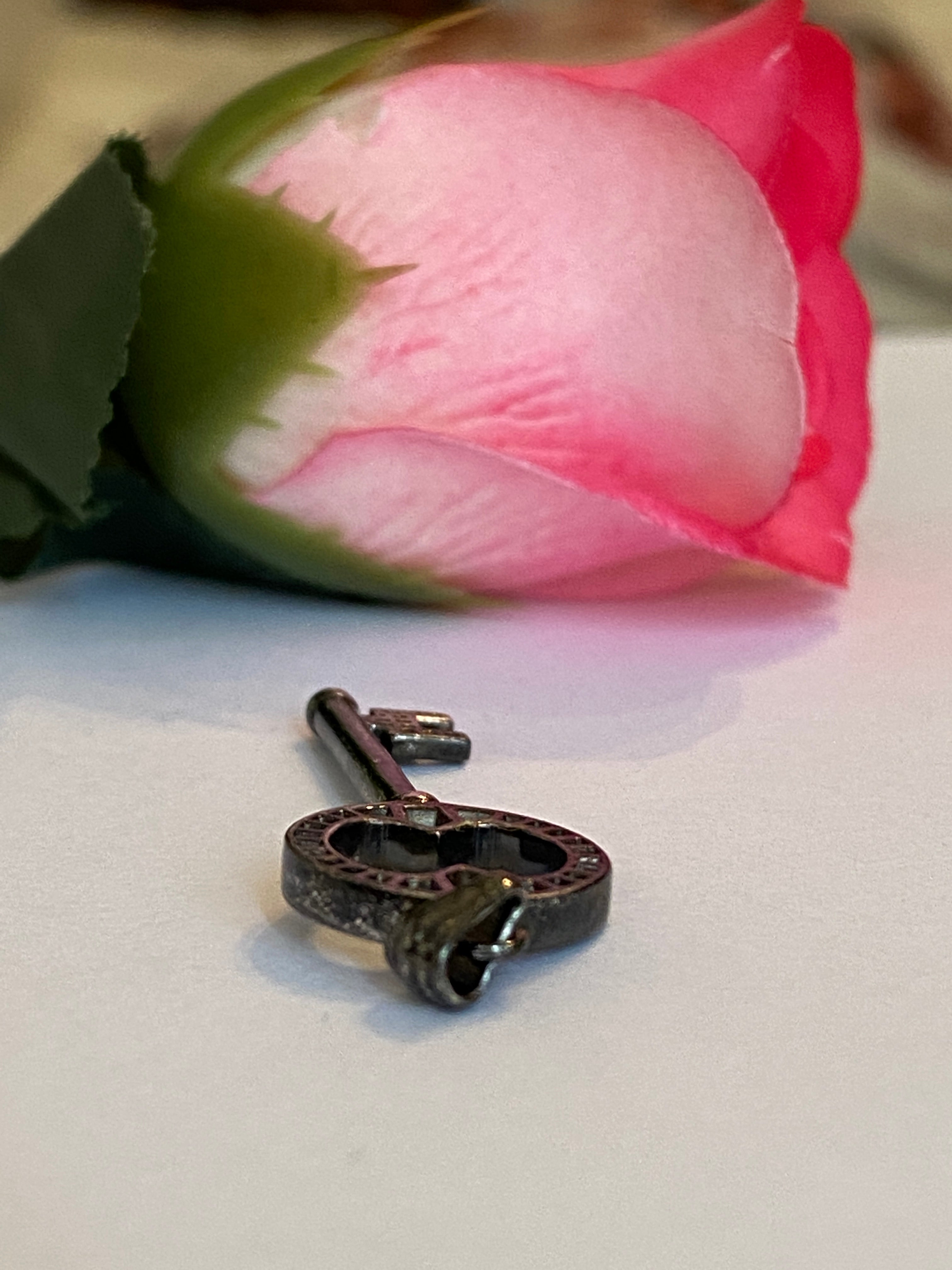 Black rhodium-plated solid 18 kt gold diamond key pendant
