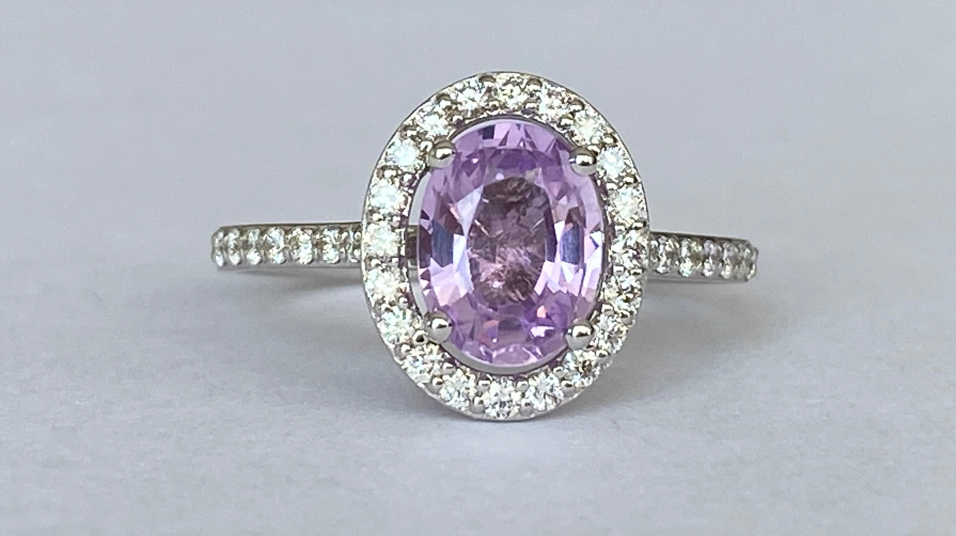 Exquisite Unheated Pink-Purple Sapphire Halo Ring in 18 kt white gold