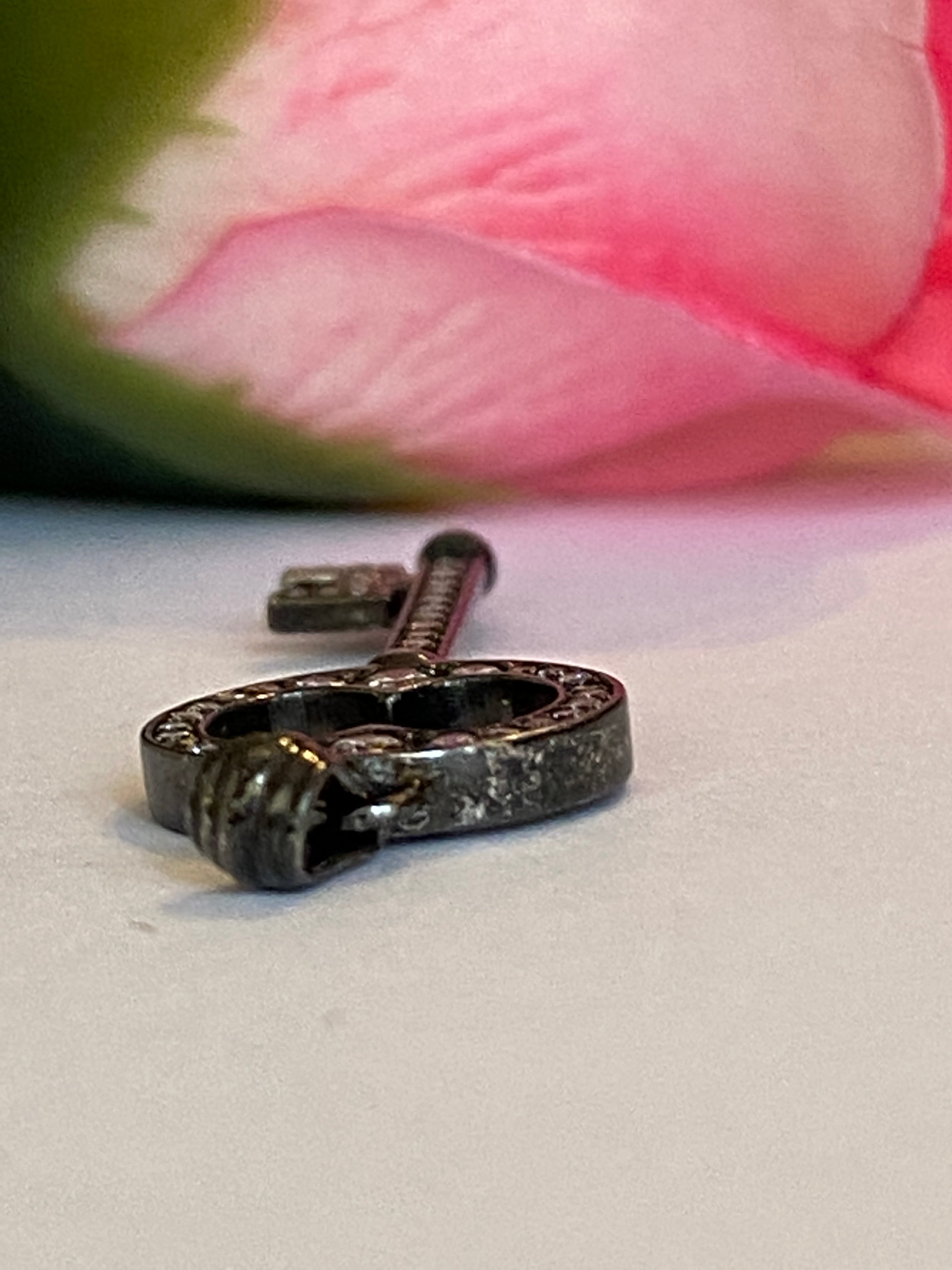 Black rhodium-plated solid 18 kt gold diamond key pendant