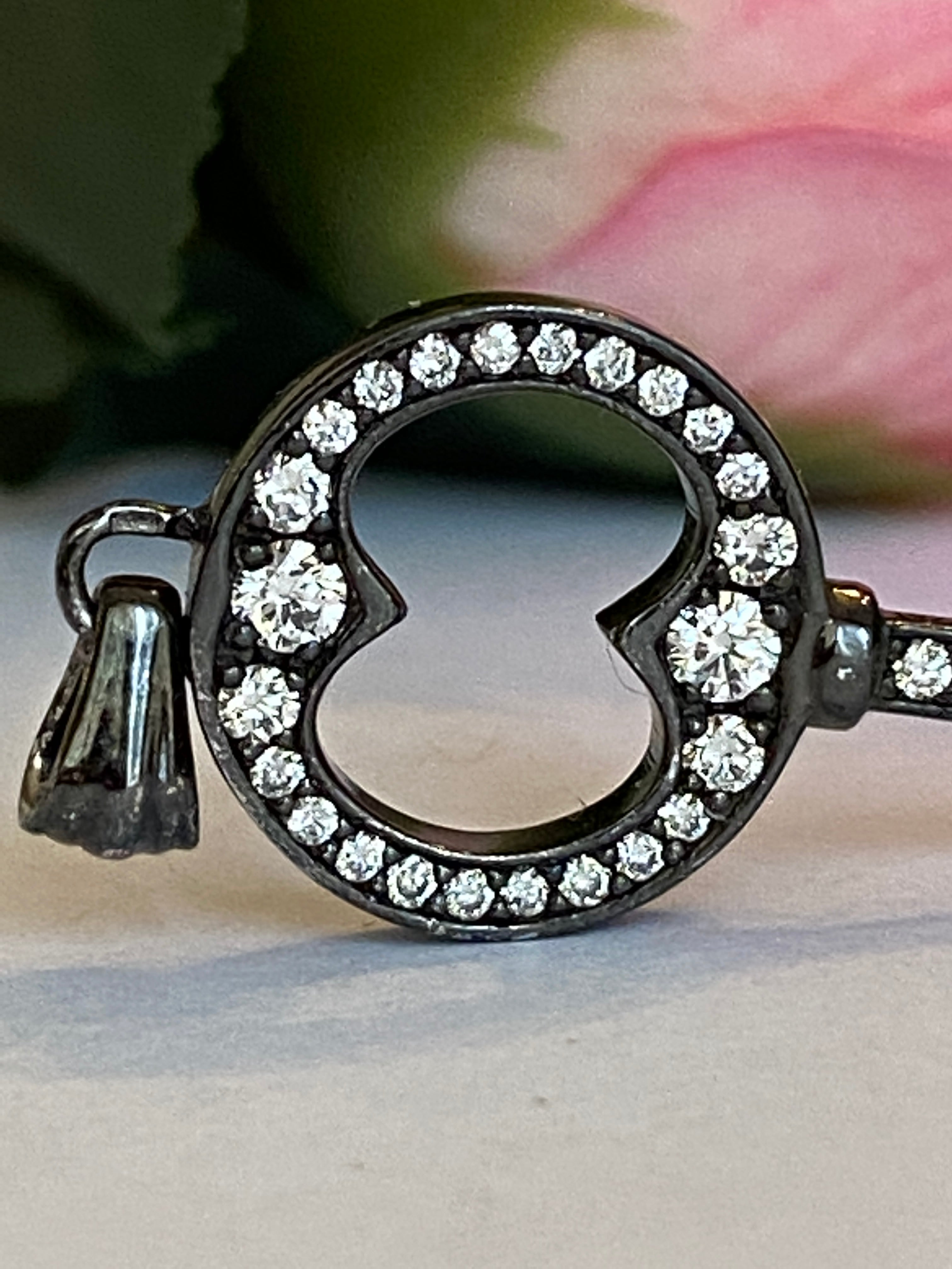 Black rhodium-plated solid 18 kt gold diamond key pendant