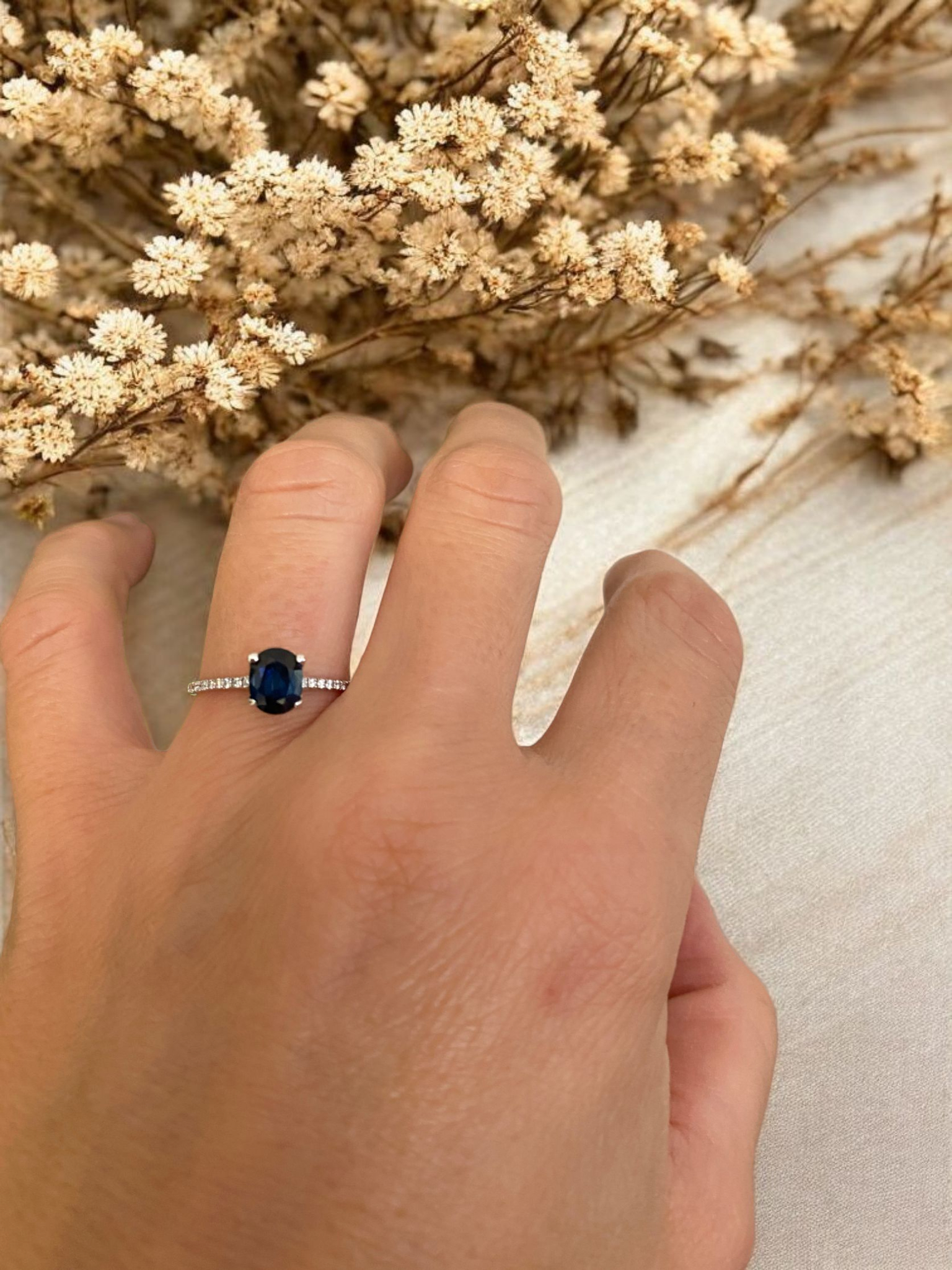 18 Kt. White Gold engagement  Ring with 1.00 Carat Sapphire and Diamonds