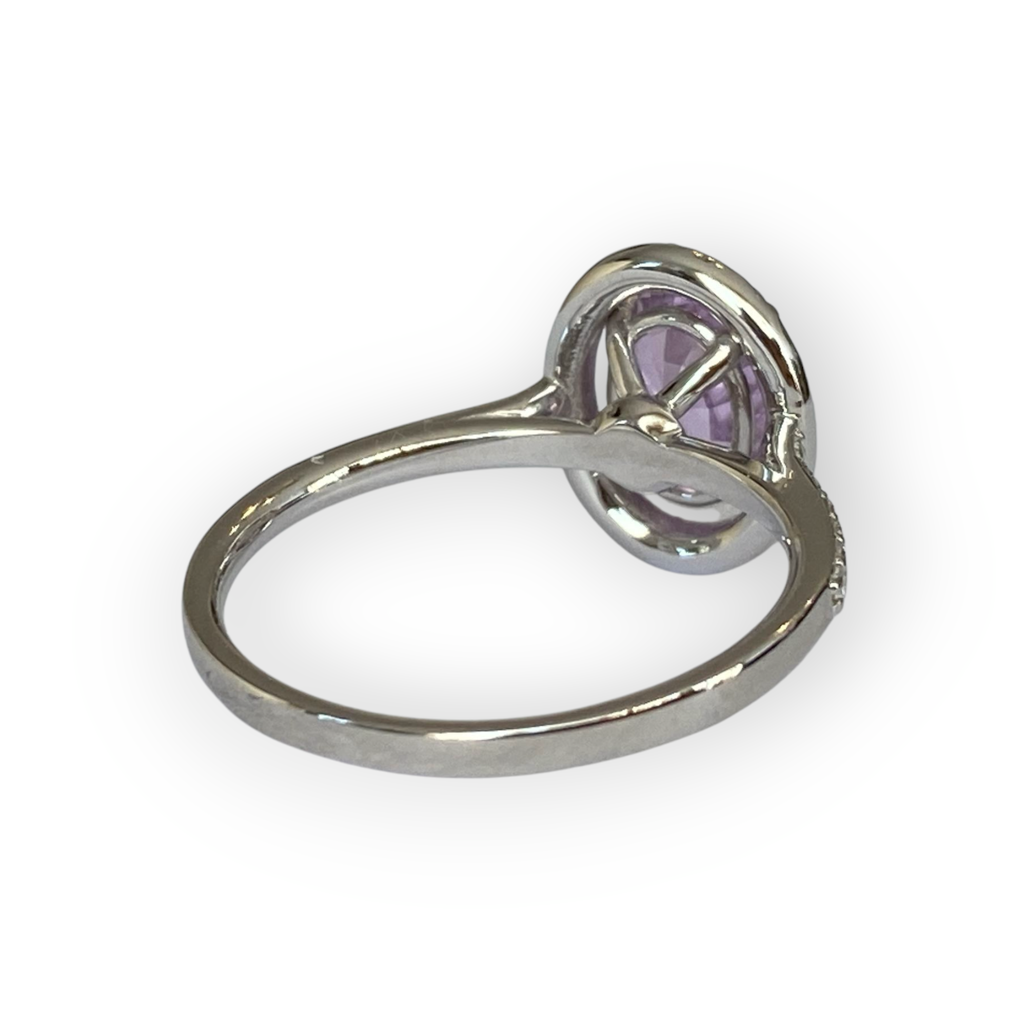 Exquisite Unheated Pink-Purple Sapphire Halo Ring in 18 kt white gold