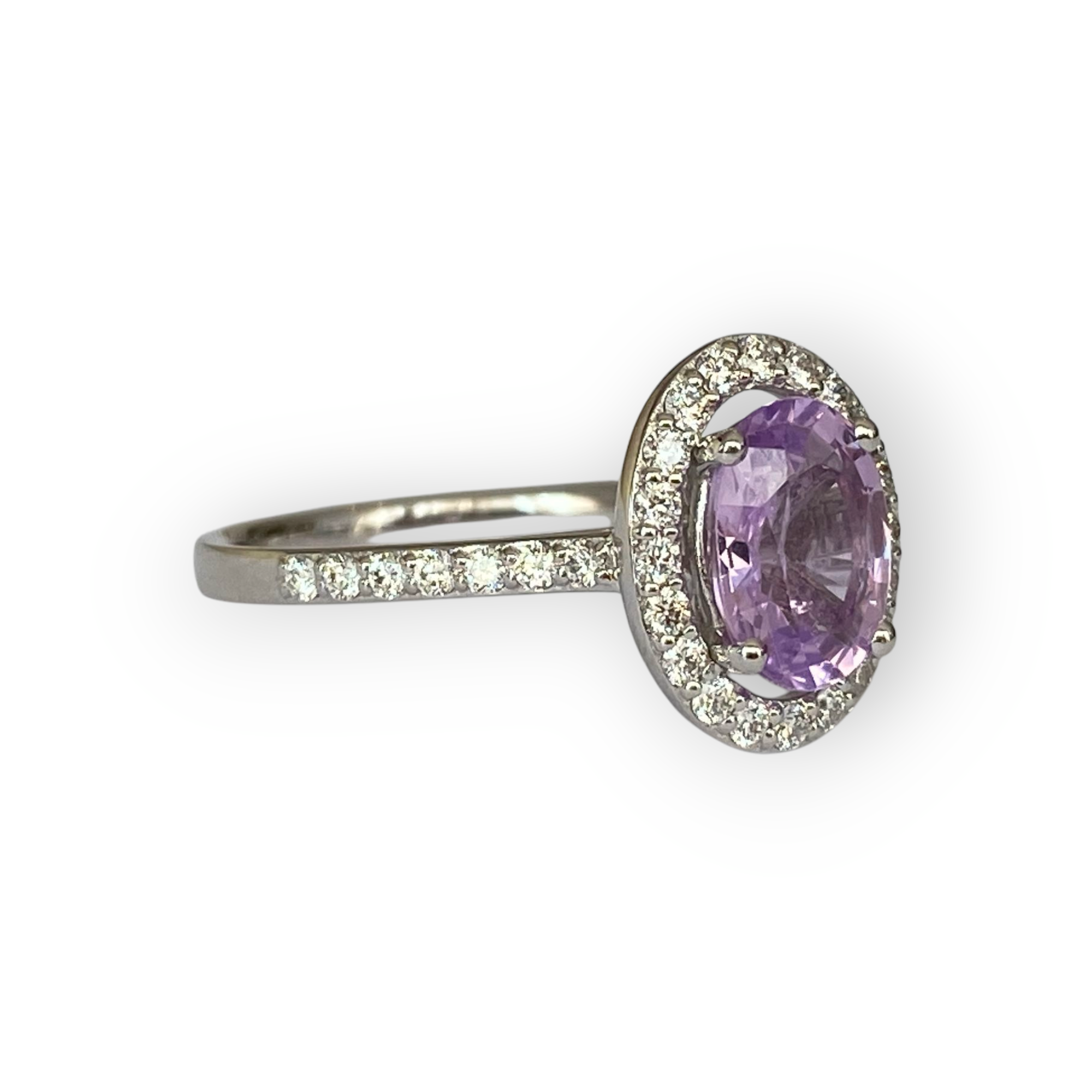Exquisite Unheated Pink-Purple Sapphire Halo Ring in 18 kt white gold