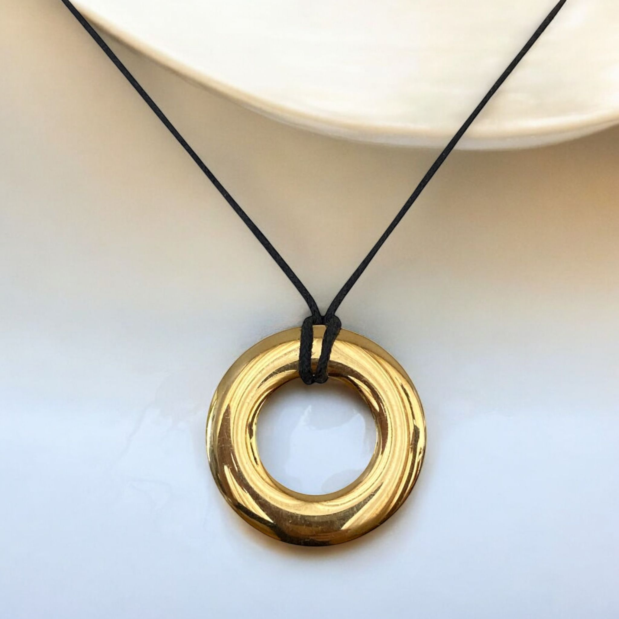Pomellato Leather coord Necklace with 18K Yellow Gold Circular Pendant
